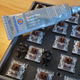 Some keyboards come with lube on the stabilizers, but not nearly enough. A little dielectric grease goes a long way in fixing that rattle.